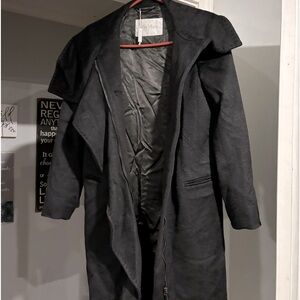 Max Mara coat size 4 never worn. Stored in closet. cost $4000 asking $2500.